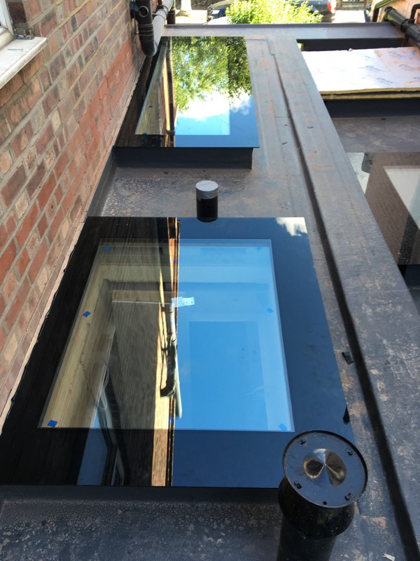 Multiple flat roof skylights on extension in Reading